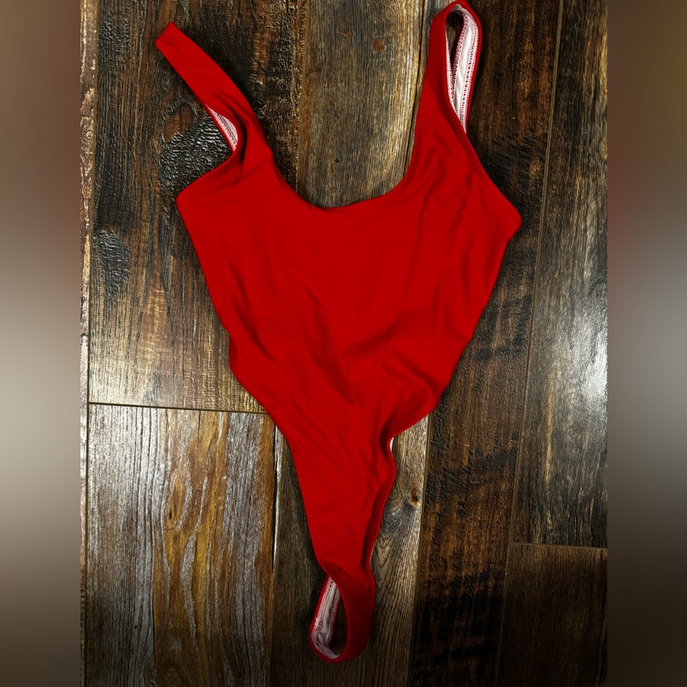 Thong Bathing Suit…. One Piece (small)